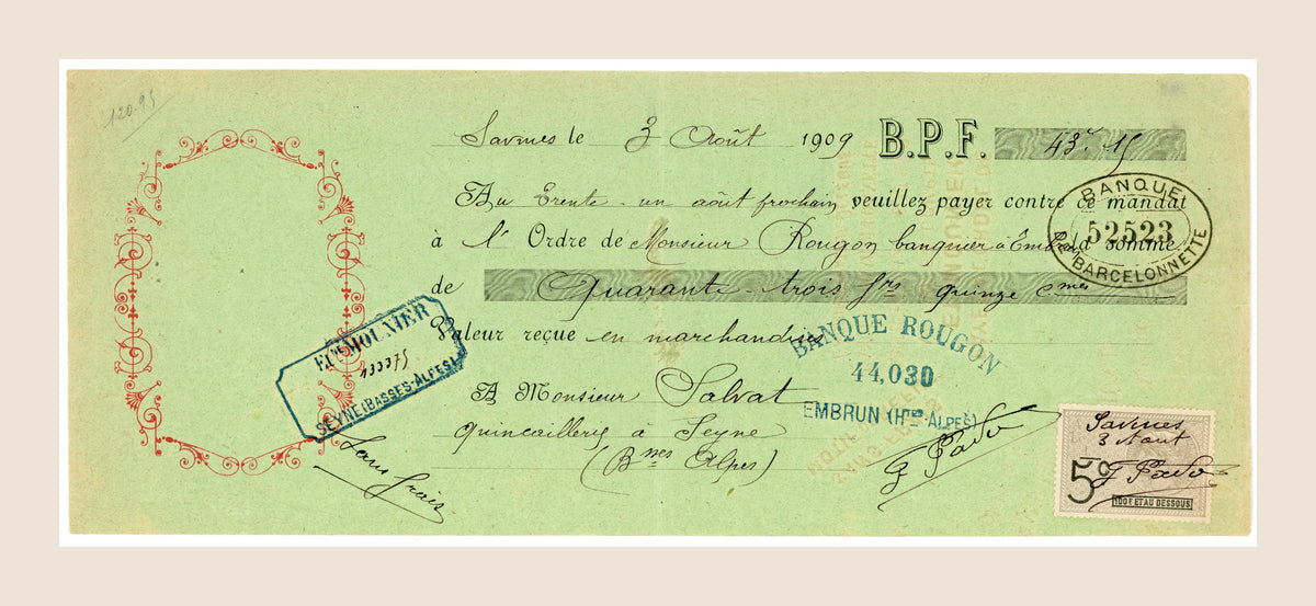 Front view of an original 1909 French bill of exchange from Savines, printed on pale green paper with ornate red decoration, handwritten entries, blue bank stamps and a 5-centime fiscal stamp.