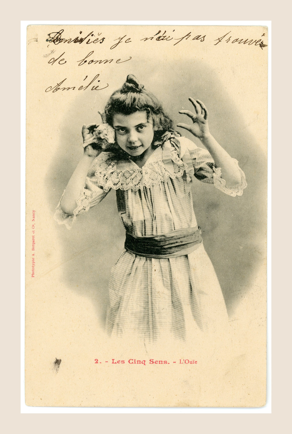 Antique Albert Bergeret Les Cinq Sens L'Ouïe French postcard showing a young girl raising her hands to her ears, with handwritten message, circa 1903.