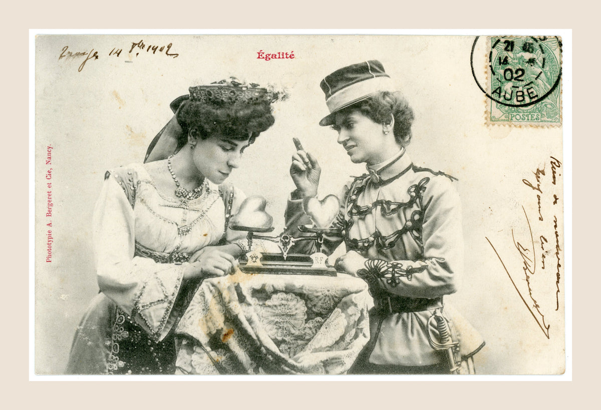 Albert Bergeret Égalité antique French postcard depicting two Belle Époque women weighing symbolic hearts on a balance scale, Nancy 1902.