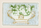 Antique postcard with white lily of the valley flowers in an ornate white and gold jardinière, in relief on a pale blue fibrous textile background.