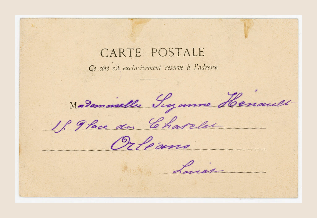 Reverse of antique Bergeret letter A postcard with handwritten address to Suzanne Hénault in Orléans and natural age-related marks.