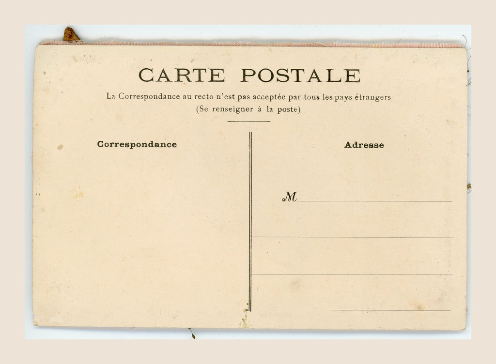 Unwritten reverse of a French antique postcard with Carte Postale, Correspondance and Adresse headings, age toning and scattered small spots.