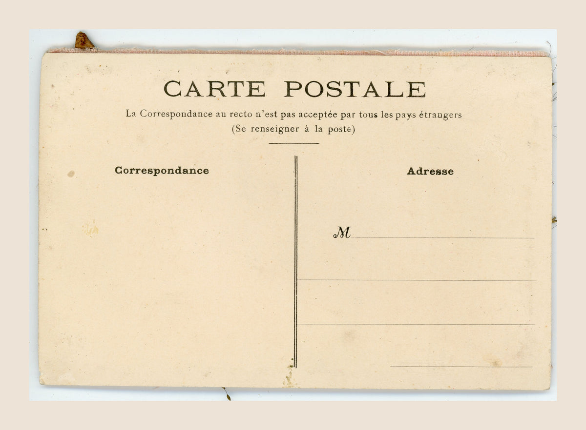 Unwritten reverse of a French antique postcard with Carte Postale, Correspondance and Adresse headings, age toning and scattered small spots.