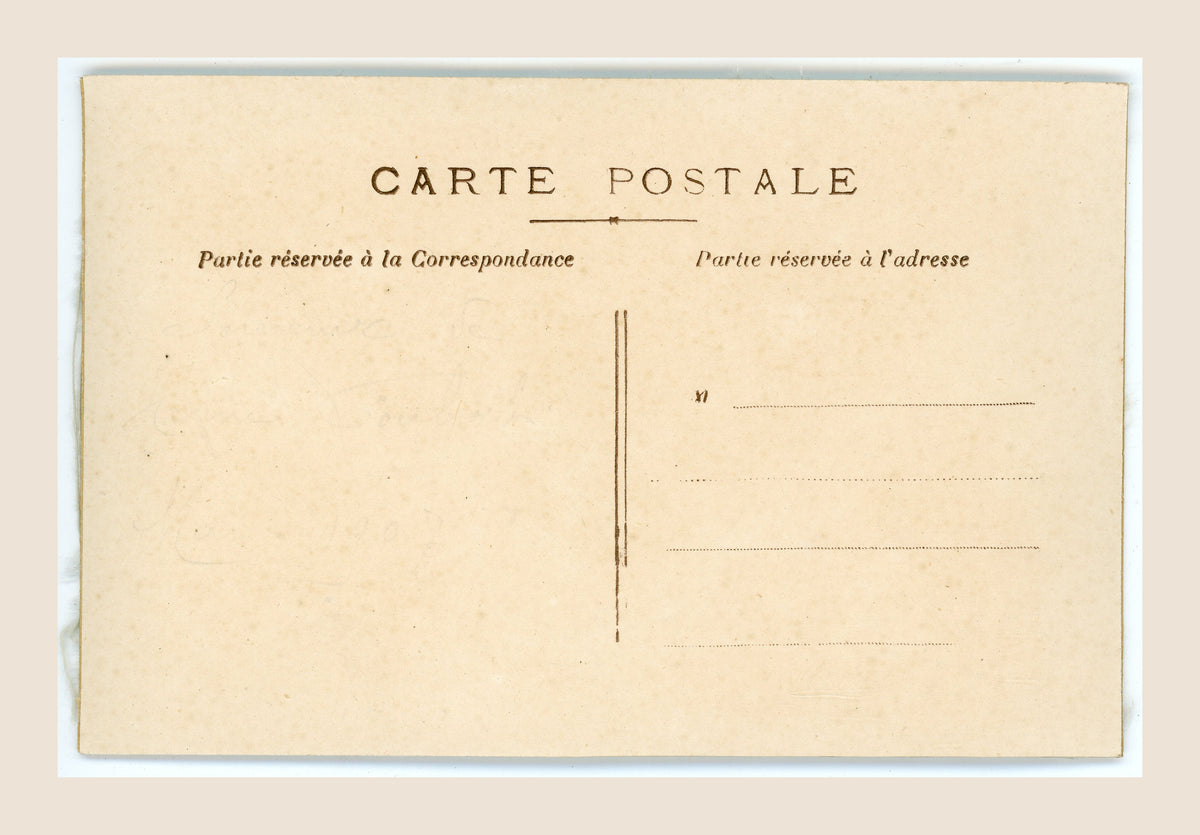 Antique postcard with white lily of the valley flowers in an ornate white and gold jardinière, in relief on a pale blue fibrous textile background.