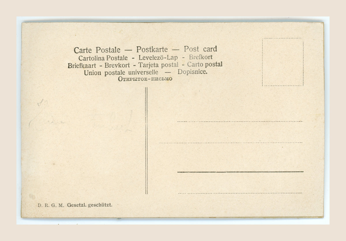 Reverse of an antique postcard with multilingual postal headings, a divided address section, D.R.G.M. marking, faint pencil traces and age-related spotting.