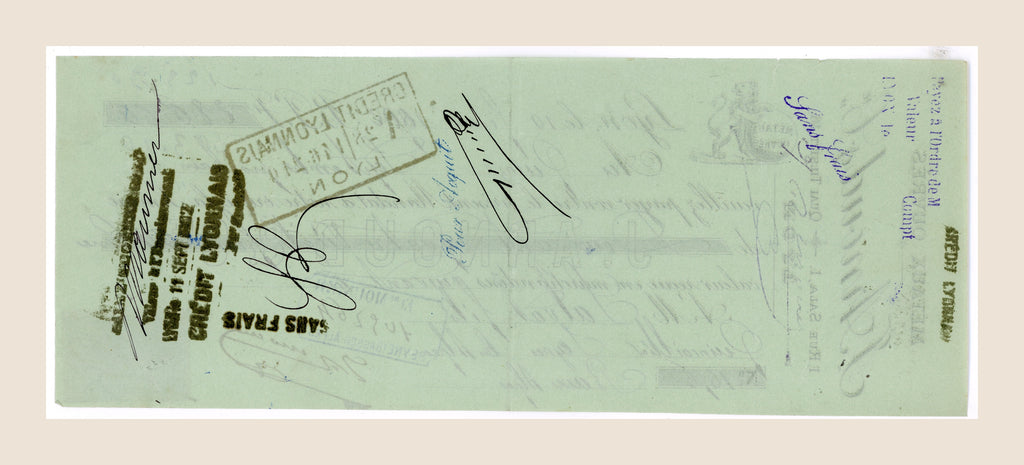 Reverse of 1902 P. Arnaud & Cie French bill of exchange with handwritten endorsements, signatures and historic banking marks
