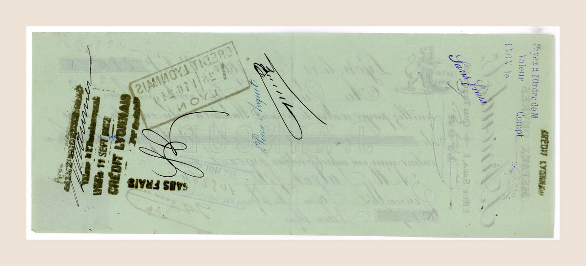 Reverse of 1902 P. Arnaud & Cie French bill of exchange with handwritten endorsements, signatures and historic banking marks
