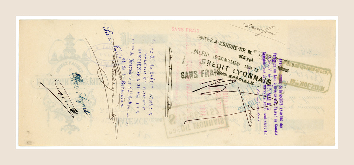 Reverse of 1906 French bill of exchange with handwritten endorsements, signatures and historic bank markings