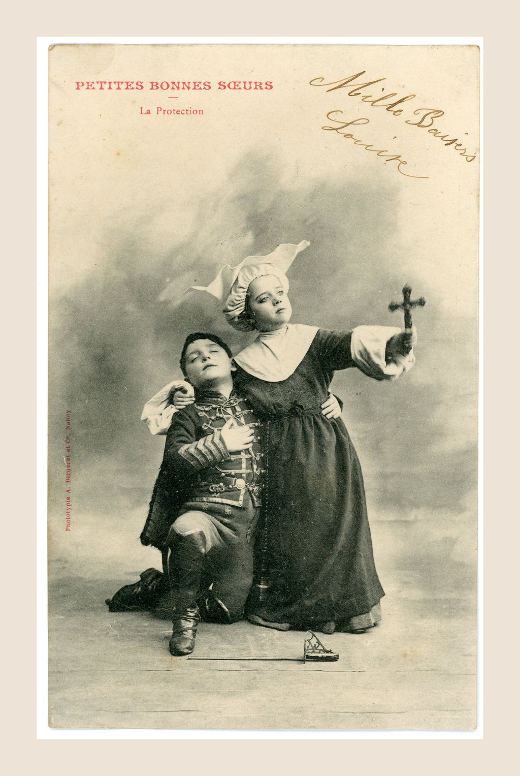 Albert Bergeret Petites Bonnes Sœurs La Protection antique postcard showing a girl dressed as a nun raising a crucifix beside a kneeling boy in uniform