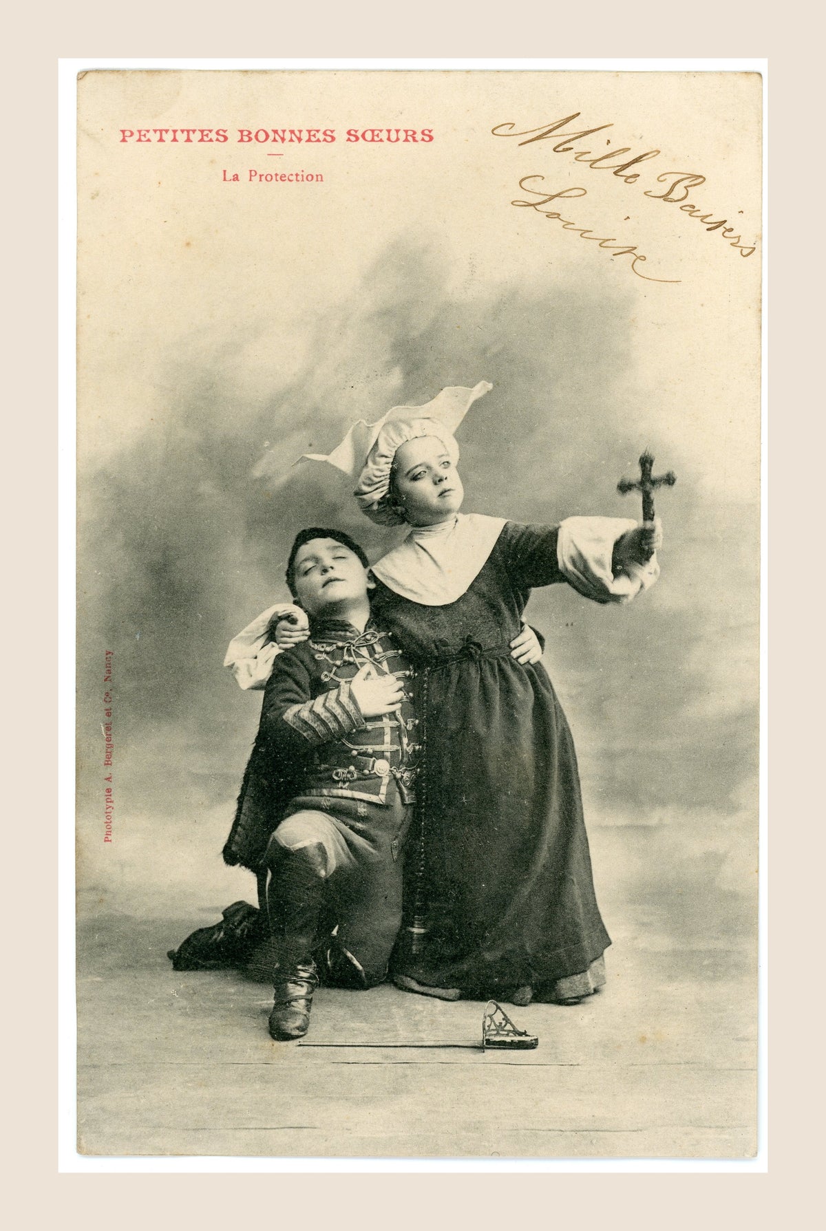 Albert Bergeret Petites Bonnes Sœurs La Protection antique postcard showing a girl dressed as a nun raising a crucifix beside a kneeling boy in uniform