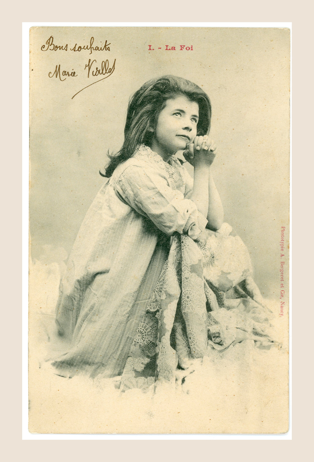 Antique Albert Bergeret postcard No. I La Foi depicting a young girl with clasped hands in a contemplative pose, with original handwritten greeting.