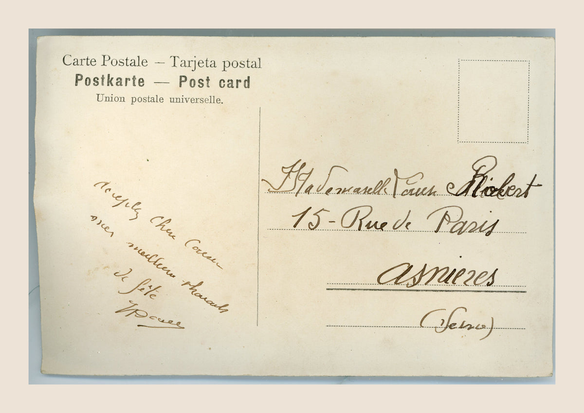 Reverse of the antique fan postcard with a handwritten French message and an address in Asnières, Seine, with no stamp or postmark visible.