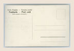 Reverse of an antique postcard with multilingual postal headings, faint pencil writing, a blank stamp box and scattered age-related spots.