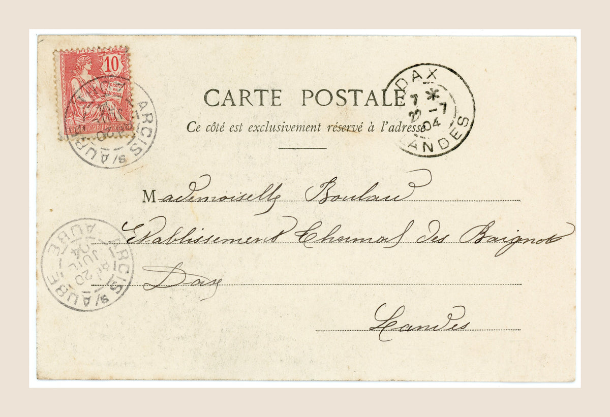 Reverse of antique French Bergeret postcard number 2 with red 10 centimes postage stamp, handwritten address and Dax Landes 1904 postmark.