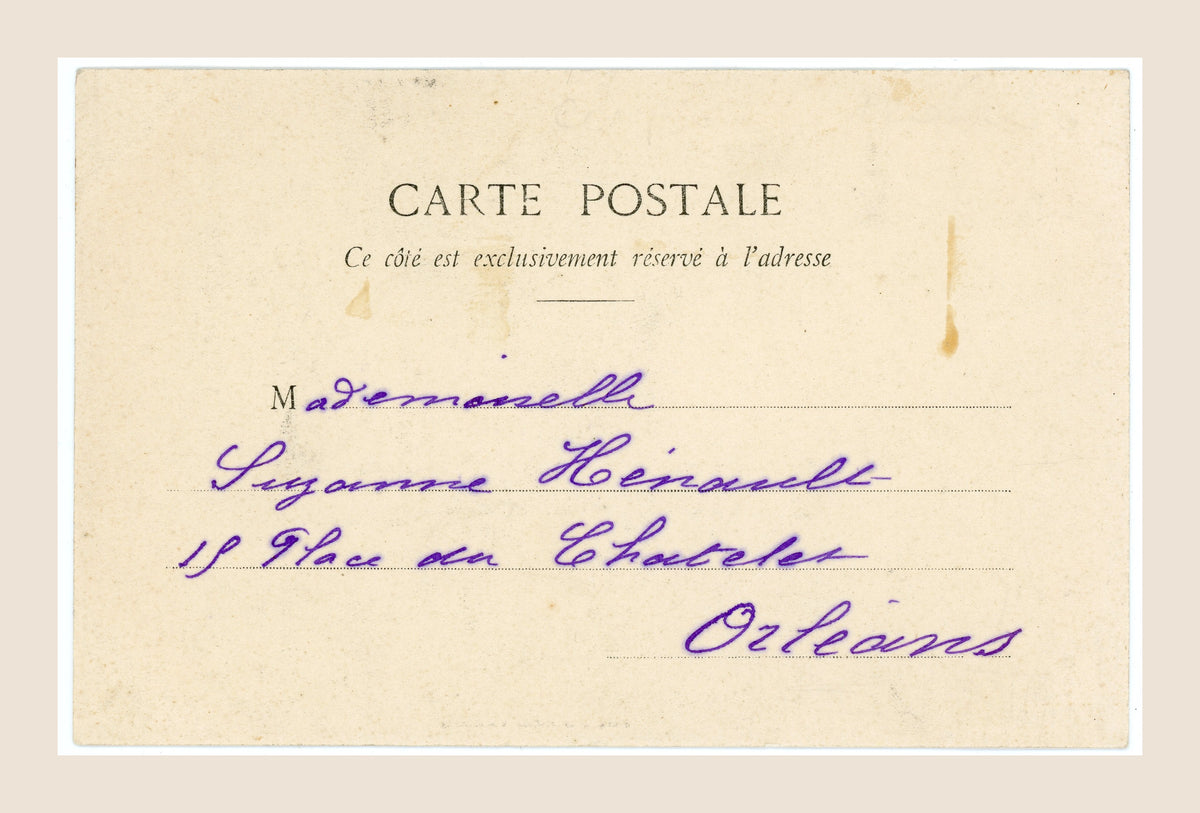 Reverse of antique French letter E schoolgirl postcard, showing handwritten address in purple ink to Suzanne Hénault in Orléans.