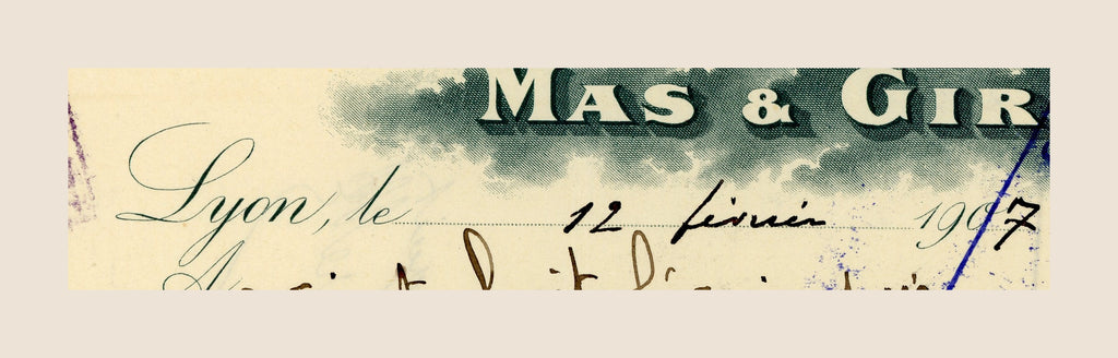 Close-up of handwritten date Lyon 12 February 1907 on antique French bill of exchange