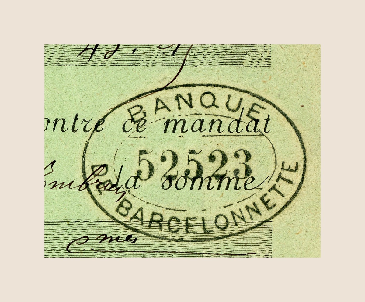 Close-up of the circular bank stamp marked "Banque Barcelonnette" with handwritten validation on the 1909 French financial document.