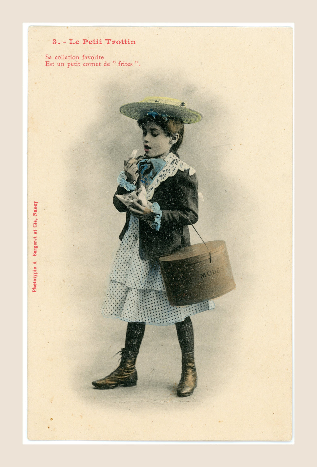 Antique Bergeret Le Petit Trottin postcard number 3 showing a young Belle Époque milliner's messenger eating French fries from a paper cone.