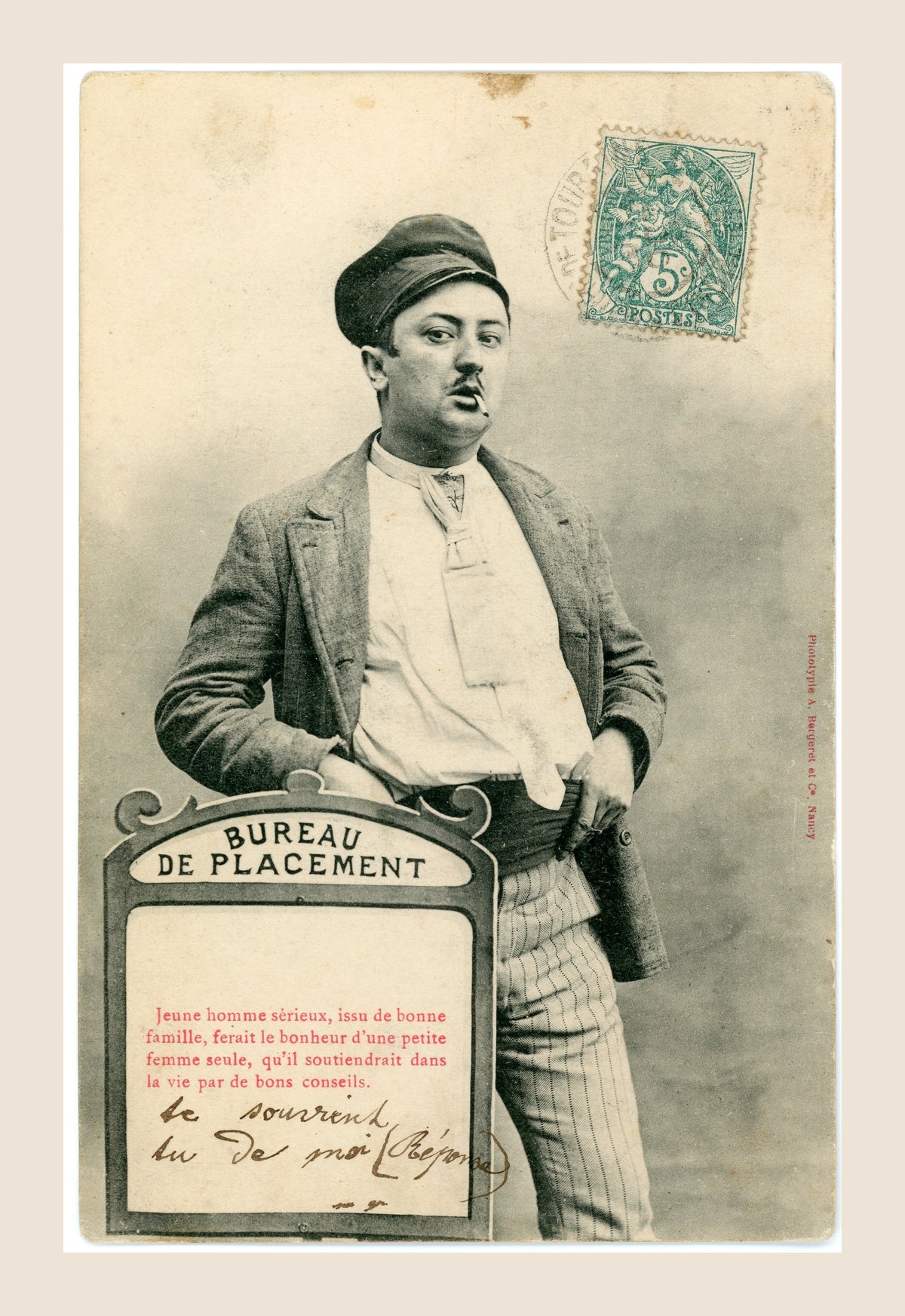 Humorous Belle Époque Bureau de Placement postcard by Albert Bergeret showing a young man in cap with cigarette and green 5 centimes stamp.