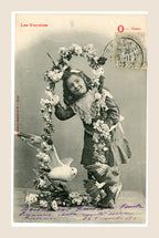 Antique French Les Voyelles letter O postcard by Bergeret, featuring a young girl with birds and a circular floral garland, Belle Époque.