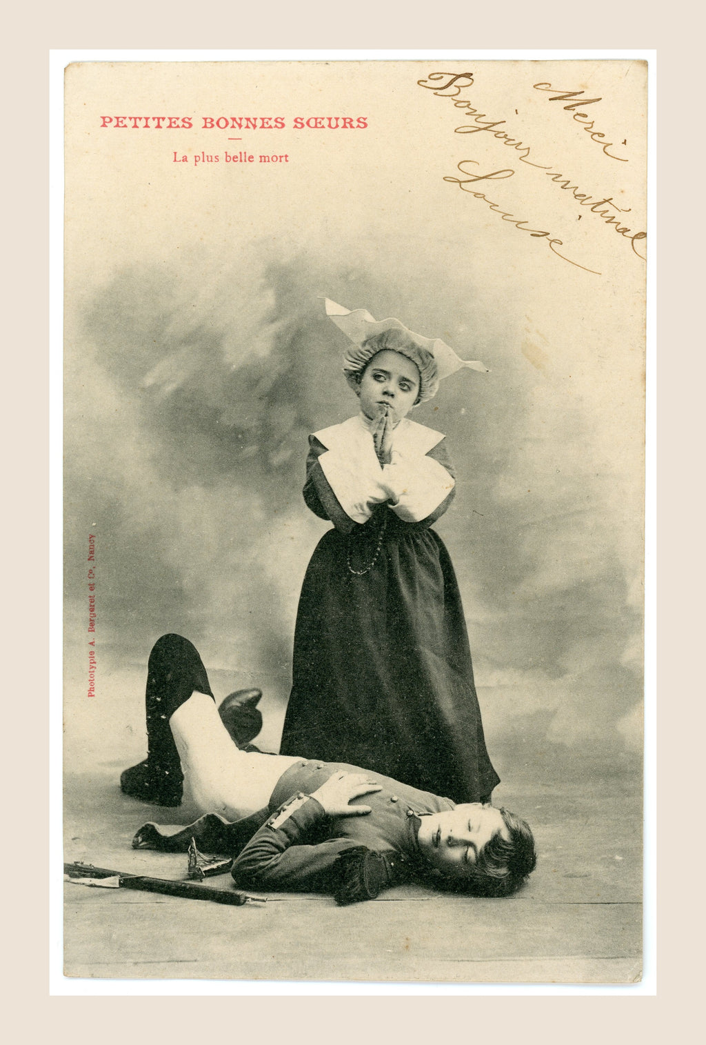 Antique Albert Bergeret Petites Bonnes Sœurs La plus belle mort postcard showing a girl dressed as a nun praying beside a boy lying on the ground.