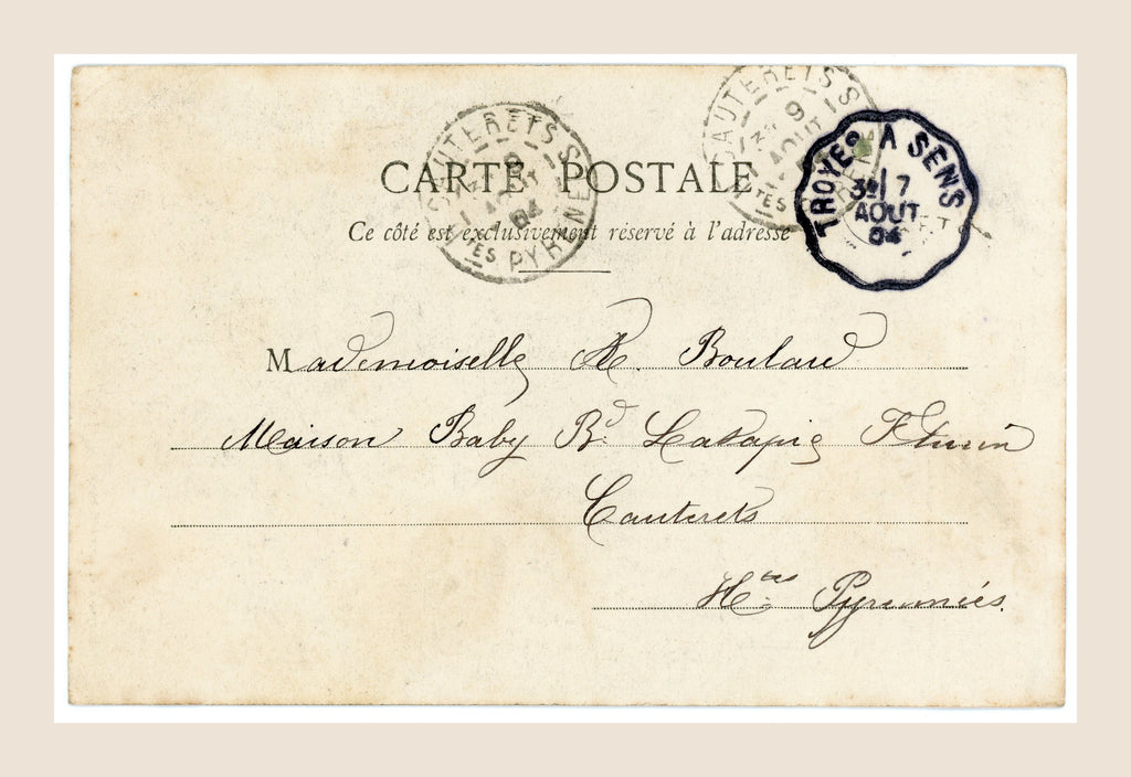 Reverse of antique French Bergeret postcard number 5 with handwritten address, August 1904 French postal cancellations and naturally aged paper.