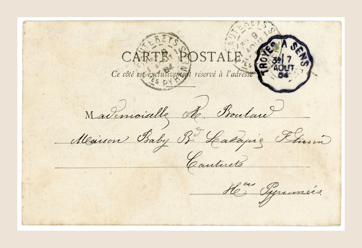 Reverse of antique French Bergeret postcard number 5 with handwritten address, August 1904 French postal cancellations and naturally aged paper.