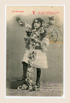 Antique French Les Voyelles letter Y postcard by Bergeret, showing a thoughtful young girl with floral garlands and a playful French alphabet caption.
