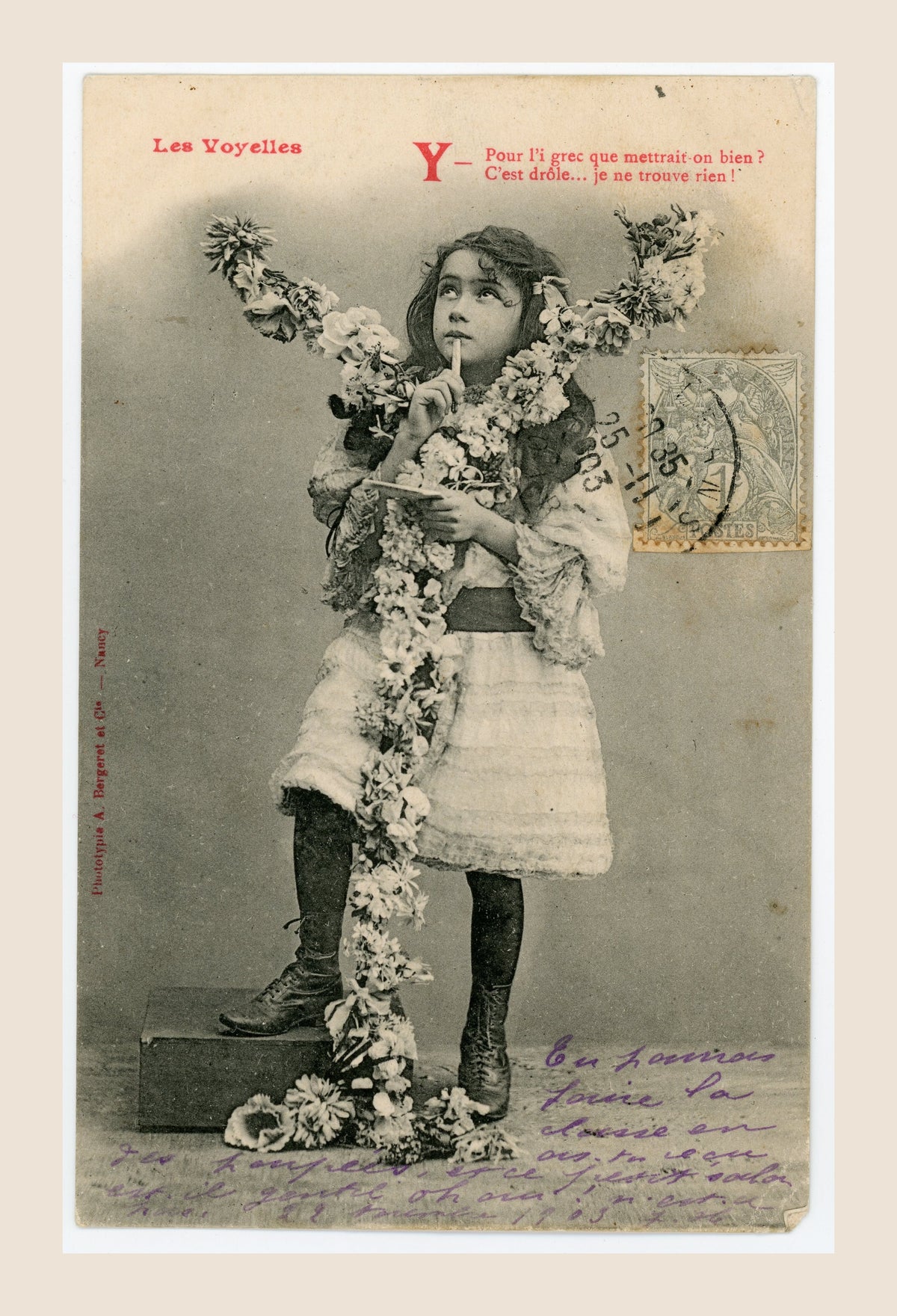 Antique French Les Voyelles letter Y postcard by Bergeret, showing a thoughtful young girl with floral garlands and a playful French alphabet caption.