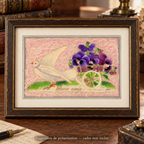 1907 New Year postcard with a white dove and purple fabric pansies on a pink textile background, displayed in a wooden frame. Frame not included.