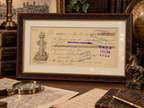 Styled framed mockup of a 1902 À la Licorne French bill of exchange displayed in an antique study