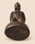 11. Underside and base of Yoruba Ere Ibeji wooden figure, showing wear, patina and original carved base