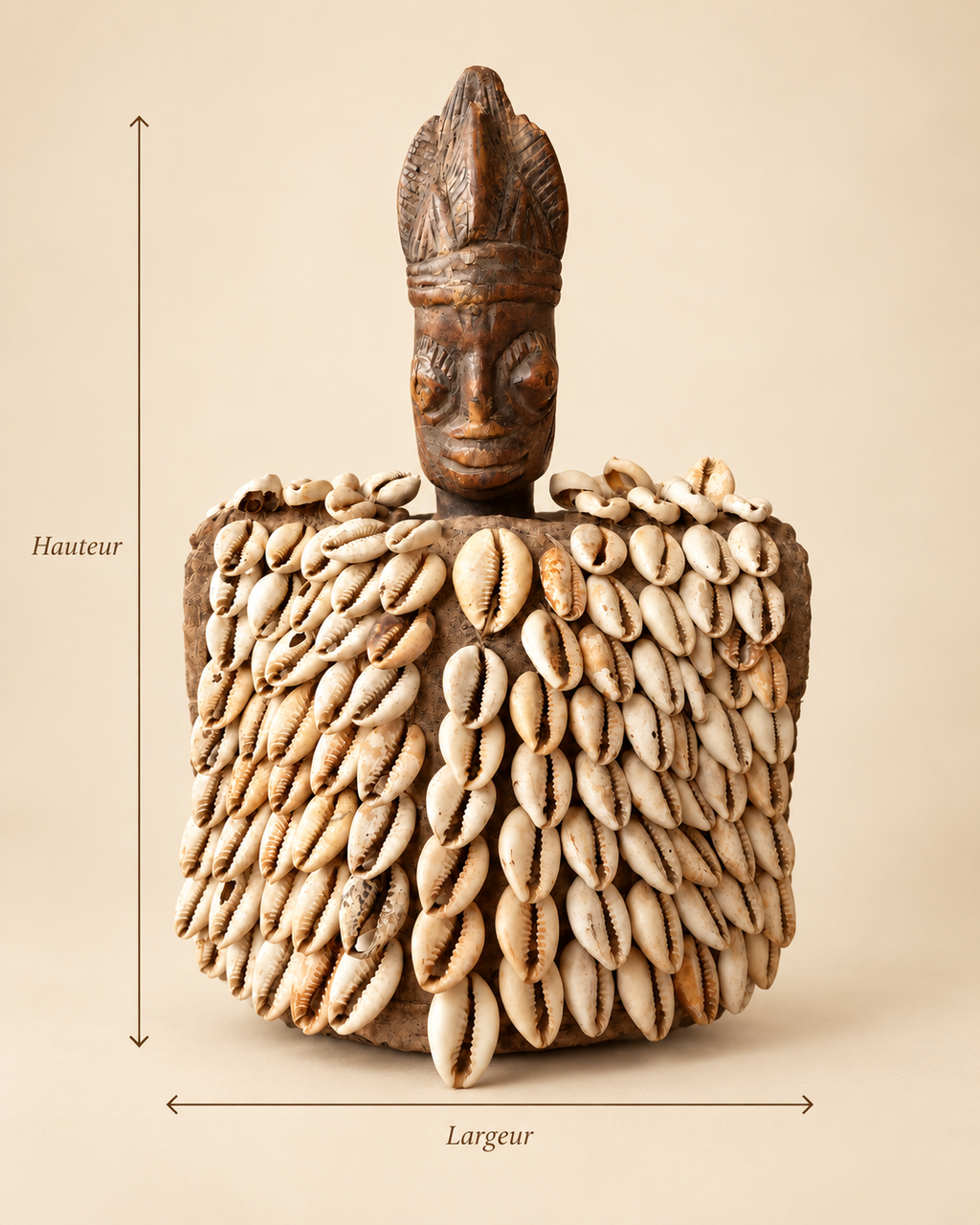 Yoruba Ere Ibeji figure with cowrie shell cloak, 26 cm high and 19 cm wide, Nigeria