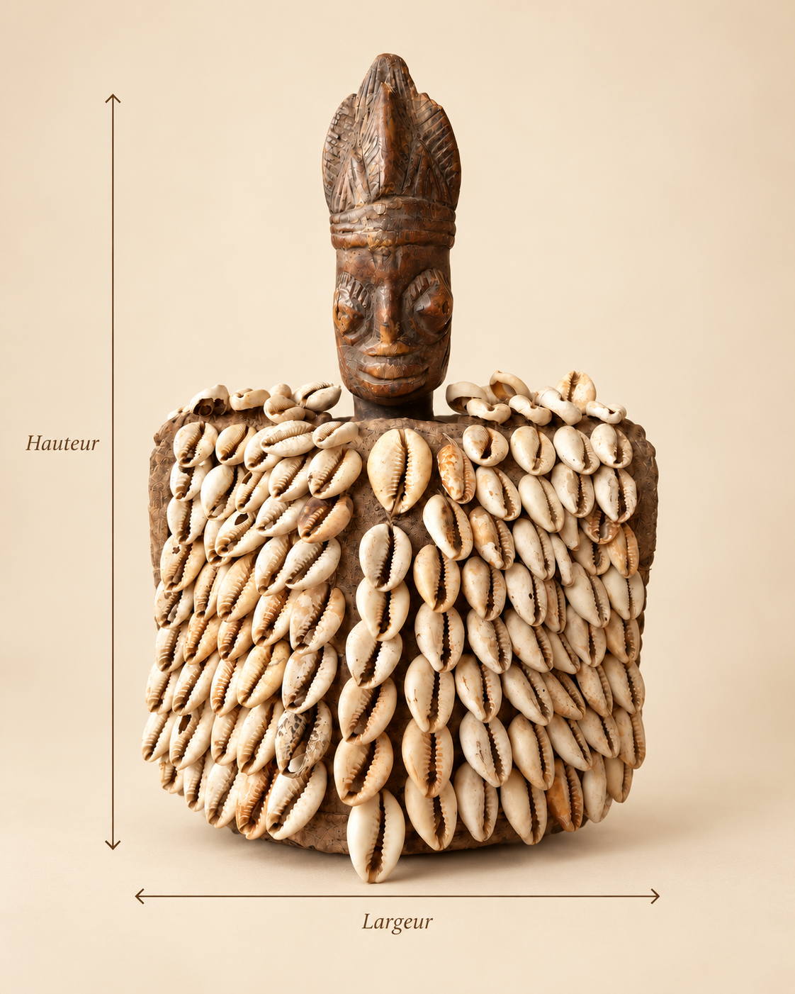 Yoruba Ere Ibeji figure with cowrie shell cloak, 26 cm high and 19 cm wide, Nigeria