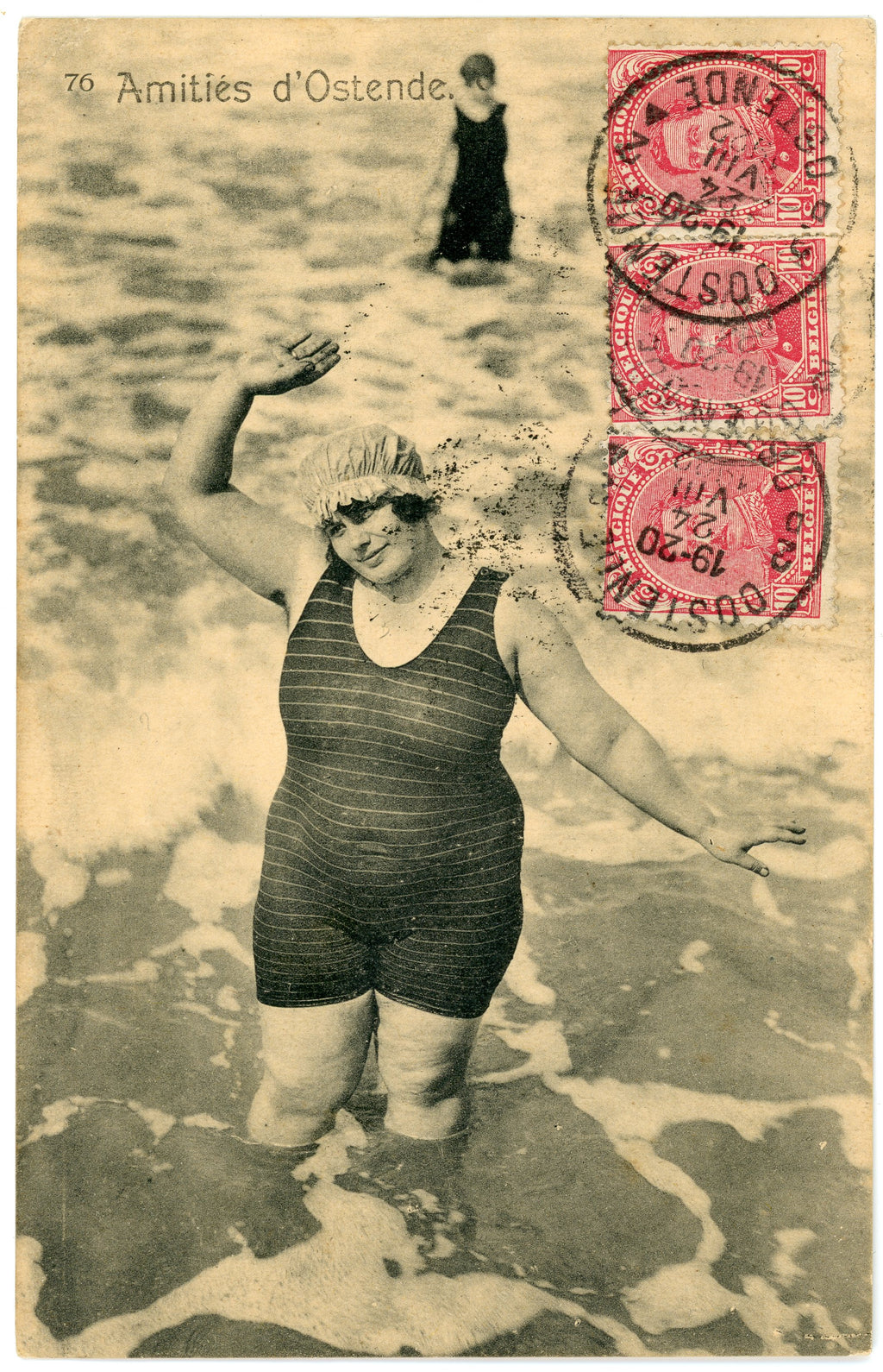 Vintage “Amitiés d’Ostende” postcard showing a waving bather in striped swimwear, with three red Belgian stamps and 1920 postmarks.